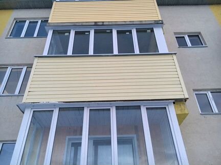 Остекление балконов, отделка домов сайдингом