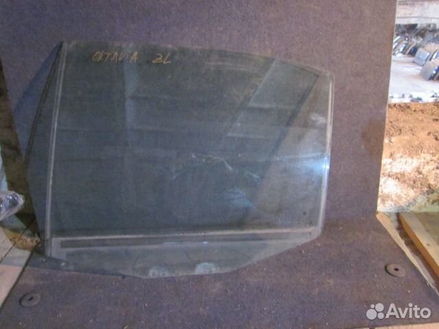 Стекло задней левой двери Шкода Октавия тур