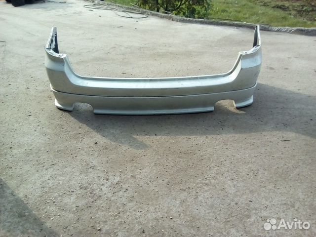 Бампер задний 57704-AG040 Legacy BLN/BPN