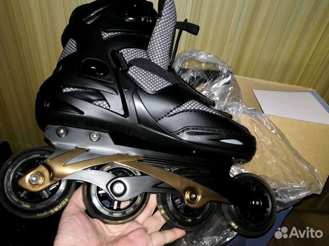 Роликовые коньки