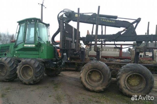 John Deere 1110D тягач прицеп