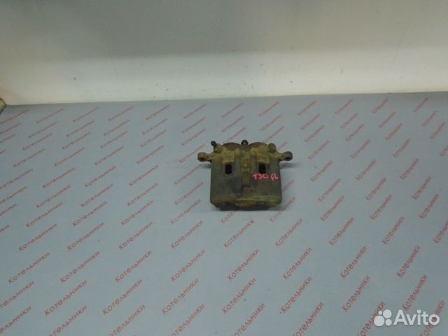 Nissan 41011-8H300 Суппорт тормозной левый