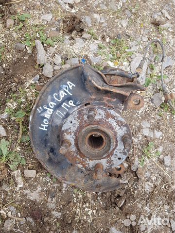 Кулак передний правый Honda Capa