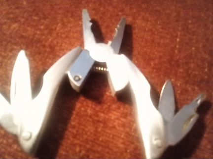 Мультитул новый