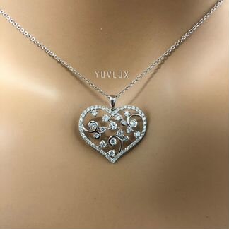 Золотая подвеска сердце 0.82 ct