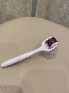 Роликовый массажер для лица